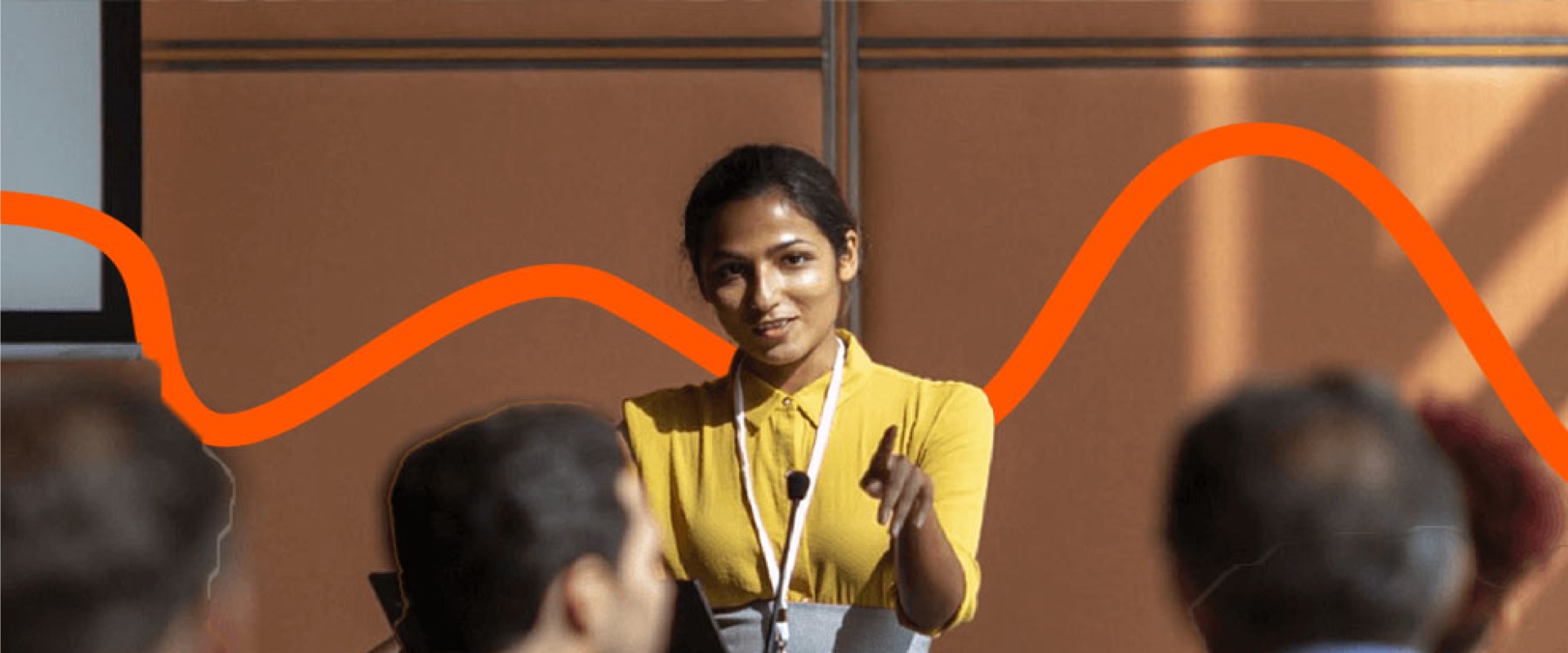 A STEP trainer taking questions from a room of professionals during a session