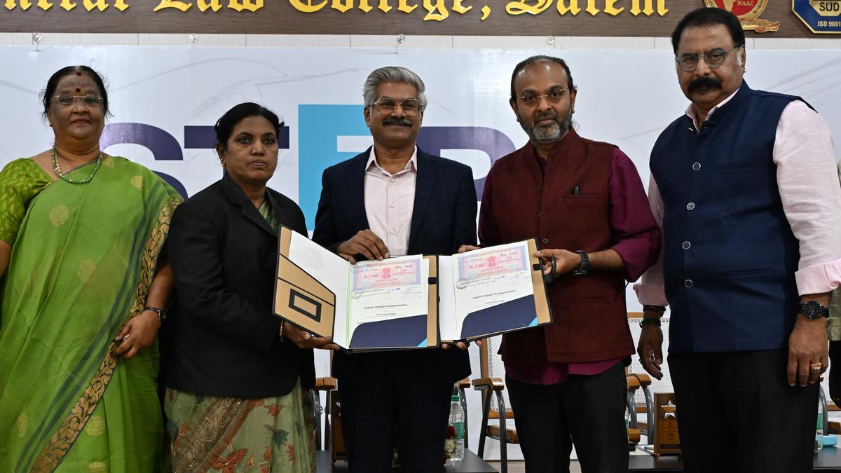 D. Saravanan, chairman of The Central Law College, exchanging copies of the MoU with G. Sai Krishnan, National Sales Head of The Hindu STEP, in Salem.